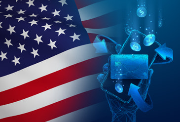 A hand holding a smartphone, a credit card, coins symbolizing online payments, and an American flag in the background