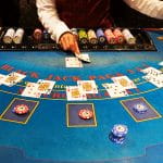 Dealer at blackjack table