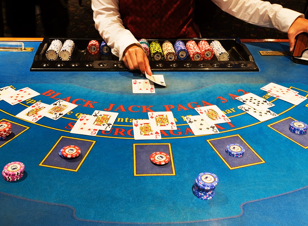 Dealer at blackjack table