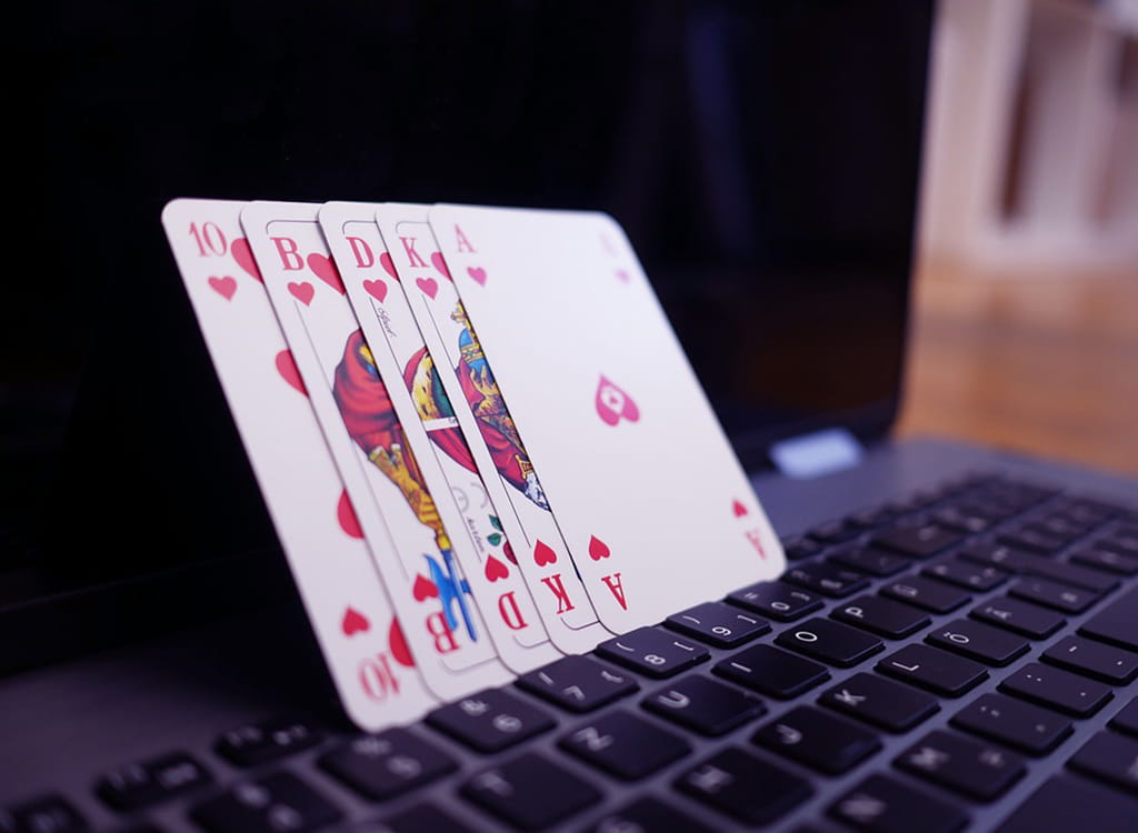 Laptop with a card deck