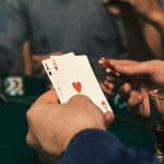 A Poker Table with Cards and Chips On It