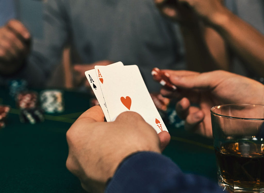 A Poker Table with Cards and Chips On It 