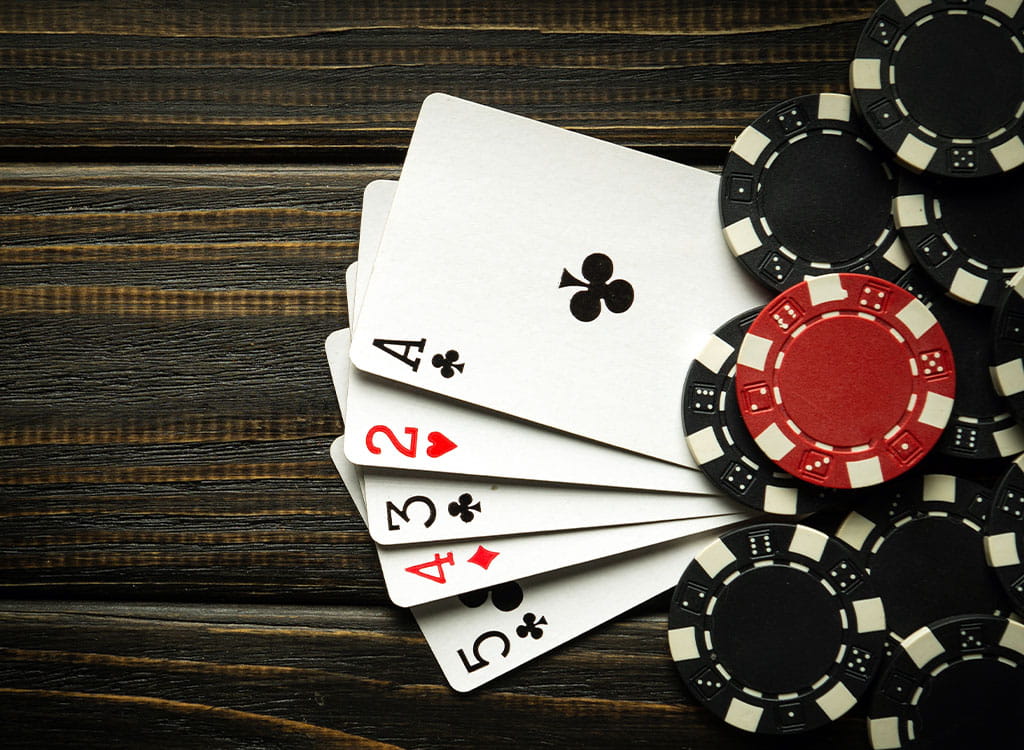 Cards and Poker Chips On A Table 