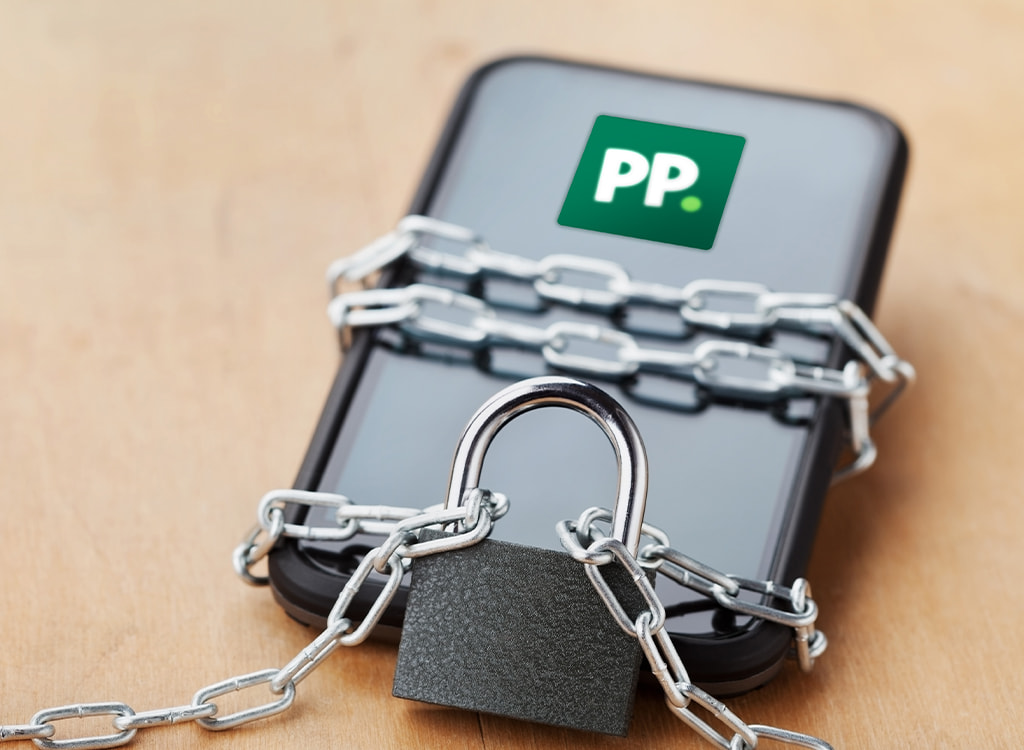 Paddy Power mobile app locked with chains and padlock, symbolizing data breach and account security concerns